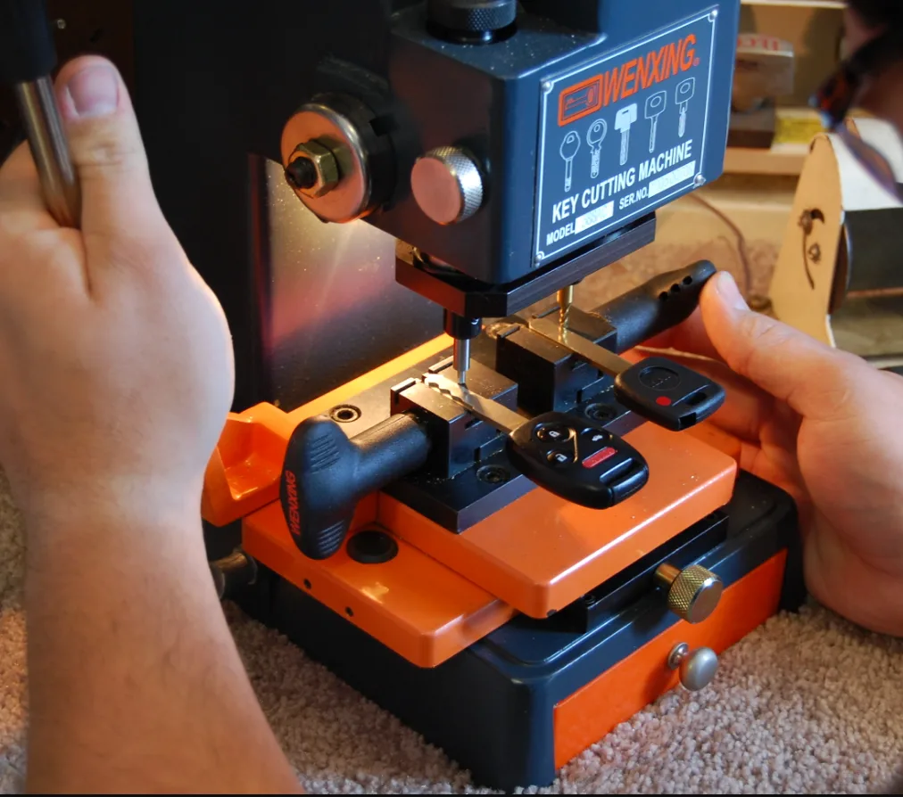 Automotive locksmith programming a transponder car key in Suntree, FL