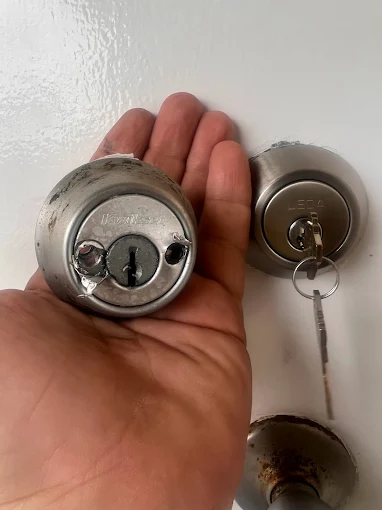 Grade 1 deadbolt being installed on a Suntree front door