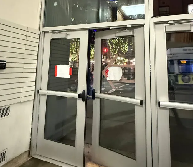 Aluminum storefront door repair on a Treasure Coast retail building